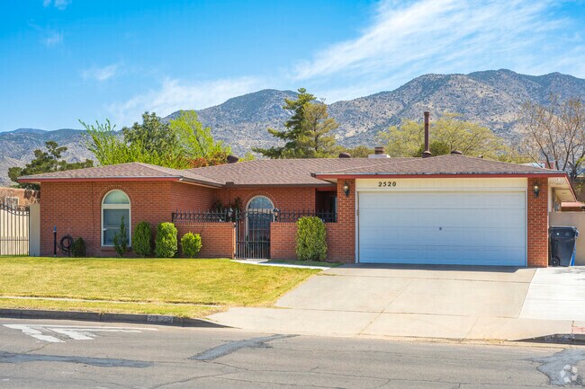Some homes in Enchanted Park have grass lawns in the front yard.