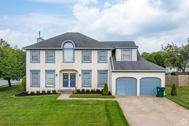Colonial homes in Mount Holly typically have large yards and sit on quiet streets.