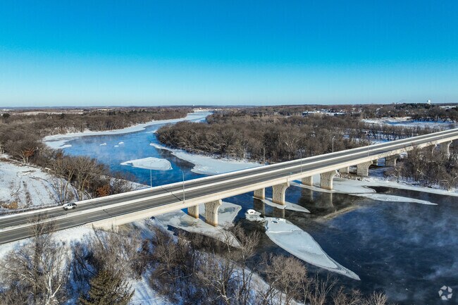 The winding Mississippi River meanders through the city of Sartell.