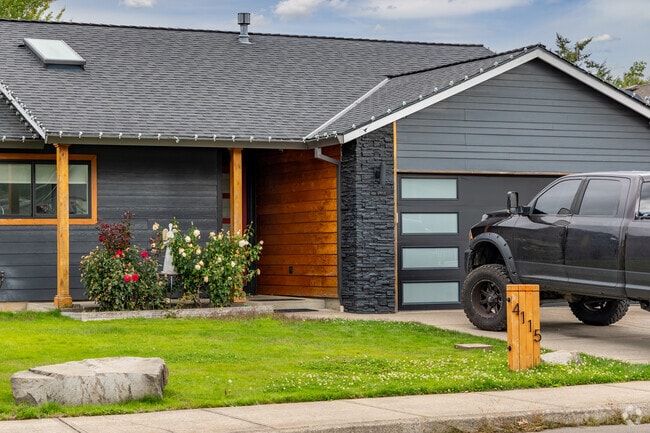 A splash of natural wood warms this ranch-style home in Four Corners.