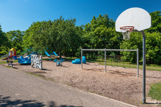 Students can play basketball or on the large playground at East Leonard Elementary School.