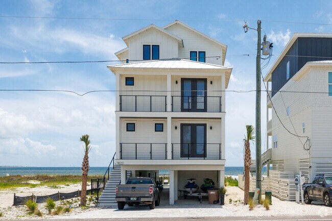 Large beach homes on the water offer spectacular views.