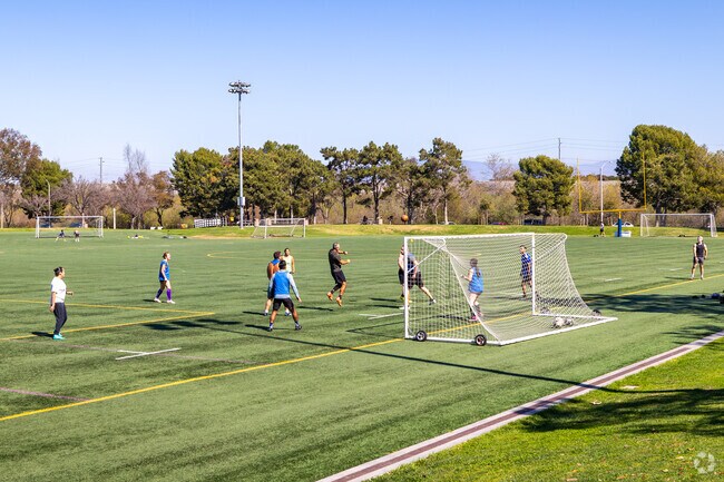 Residents enjoy afternoon soccer matches at Bonita Creek Park in Newport Beach.