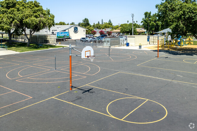 Hoover students play basketball at Robinson Elementary School in Fresno.