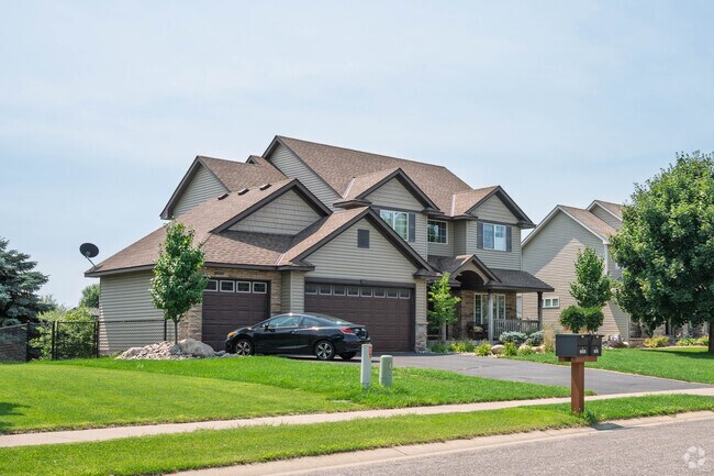 Orchard Trail features New Traditional homes built within the last 20 years on curving streets, where large front yards with manicured lawns and flower gardens create welcoming neighborhood appeal.