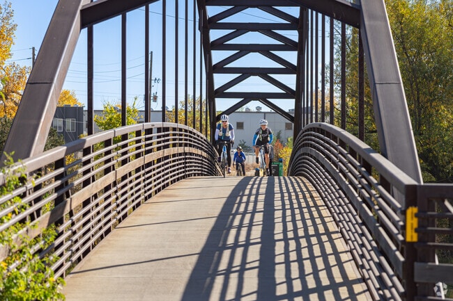 A group of friends from Belleview-Cornerstone Park enjoys a bike ride along the South Platte River.