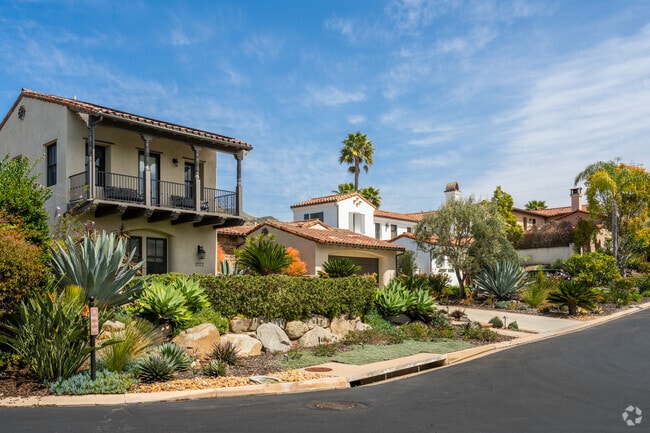 The private streets have many unique homes with beautiful front lawns in Del Sur.