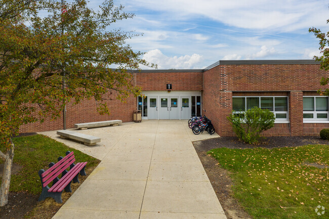 Bikes are lined up outside the entrance of Lincoln Elementary.