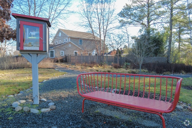 Enjoy a little free library and seating area along a path in Bailey’s Crossroads.