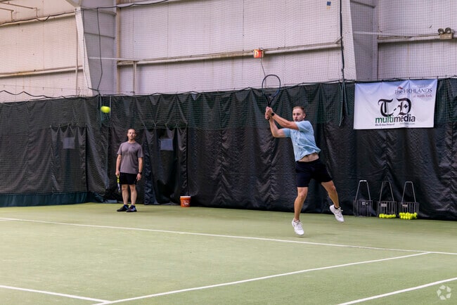 Upper Yoder residents play tennis at North Fork Country Club.