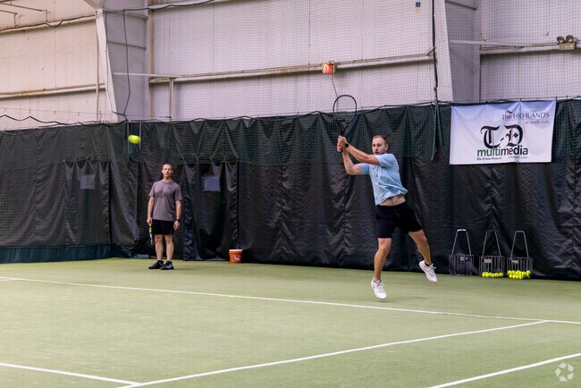 Upper Yoder residents play tennis at North Fork Country Club.