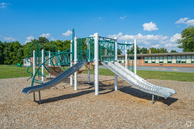 Student's at Grace Park Elementary School enjoy the playground set.