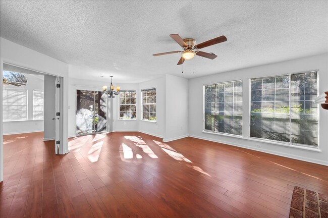 view to the living room, dinning area, and bedroom