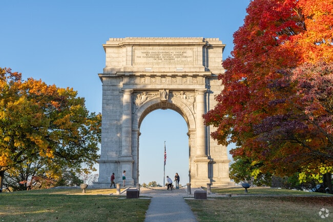 Visitors marvel at the National Arch Memorial at the Valley Forge Park, miles from Paoli.