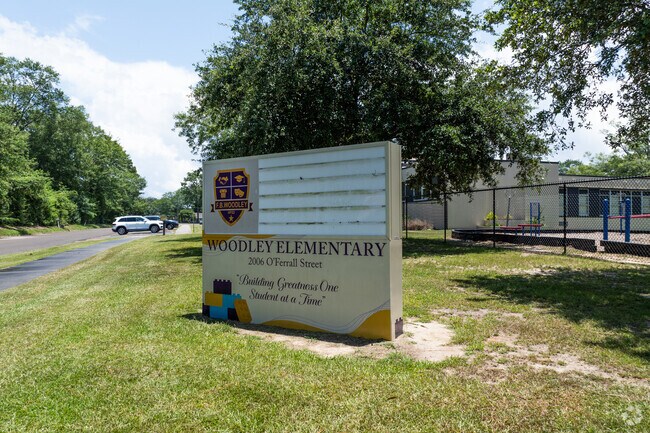 Students at Woodley Elementary School participate in various educational activities.