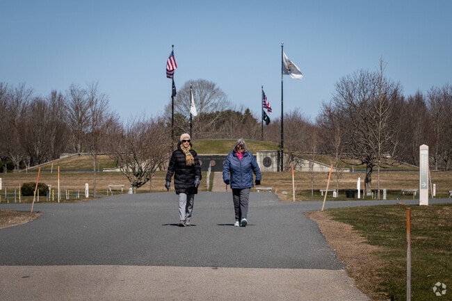 Two ladies walking through the RI Veterans Cemetery in Exeter, RI.