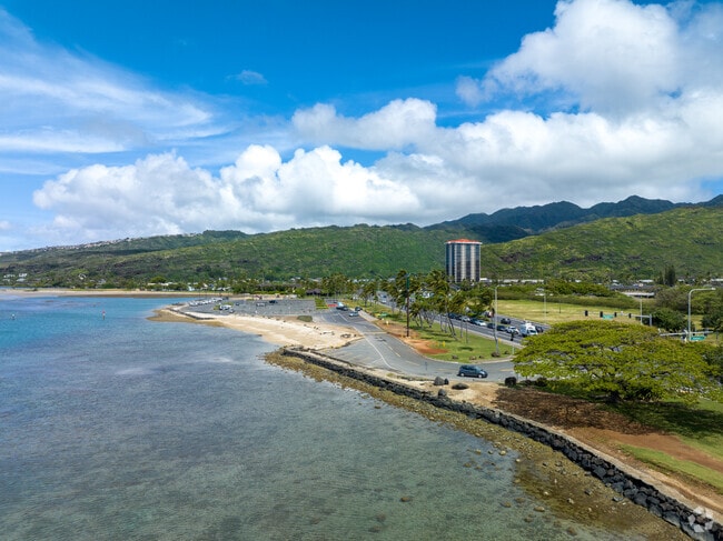 Maunalua Bay Beach Park on Hawaii Kai has a convenient parking lot.