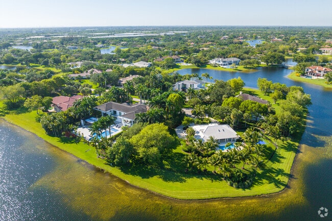 Large single-family homes on oversized lots overlooking the lake at Windmill Ranch Estates.