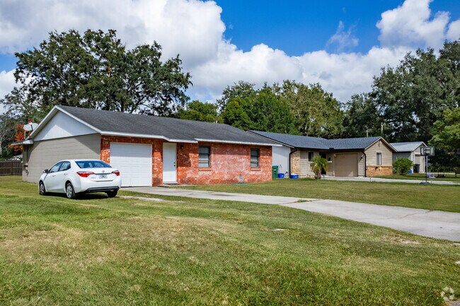 In Midway, this row of ranch-style homes boasts freshly cut grass and well maintained exteriors.