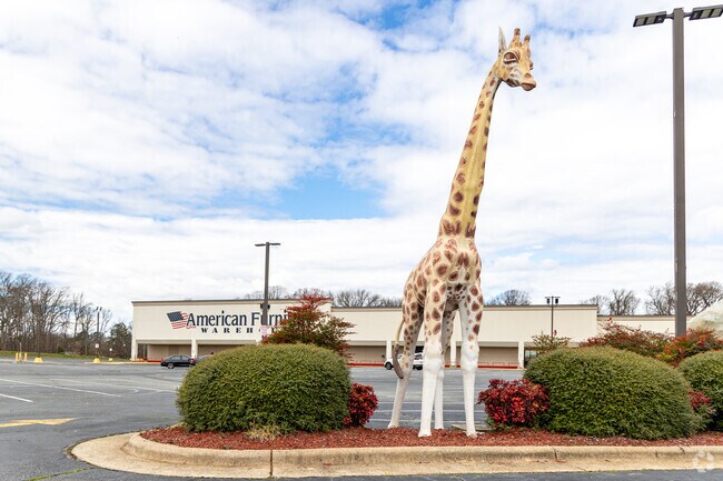 Admire the giraffe adornment at the American Furniture entrance in Hunter Hills.
