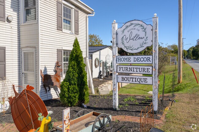 House of Willow in Adamstown, features boutique furniture and home décor in a stylish retail setting.