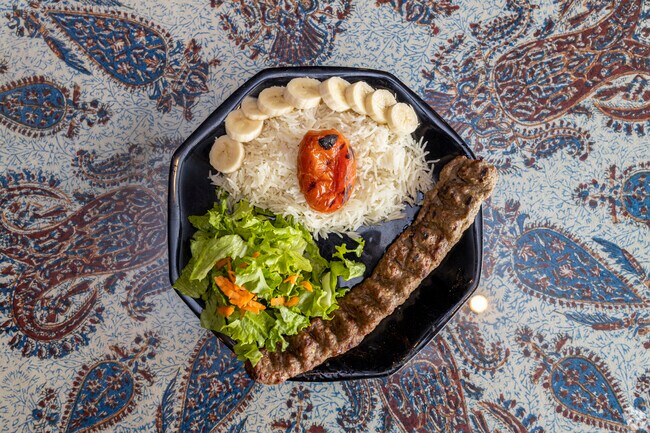 Ahmad’s Persian Cuisine is noted for Tehran Chicken near midtown.