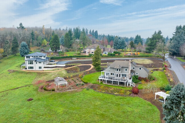 Homes with views look out over farm land in Tualatin Valley.