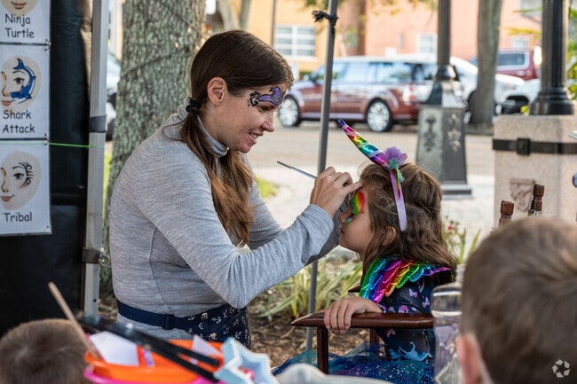 Local New Smyrna children can get their faces painted during Canal Street Oktoberfest.