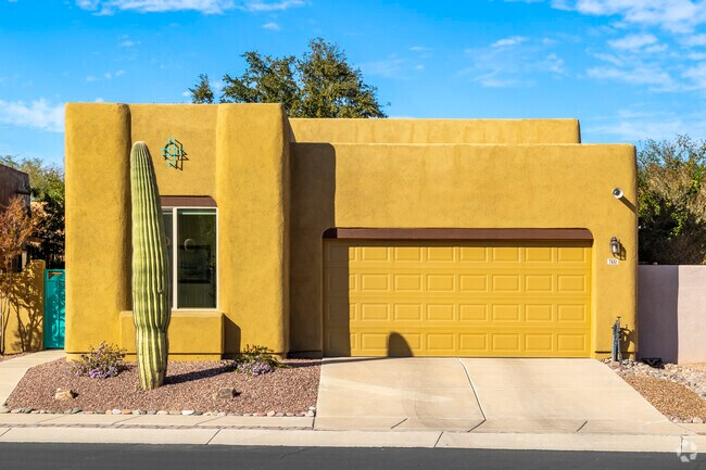 Live in a southwestern classic Pueblo Revival style home in Broadway Northeast.