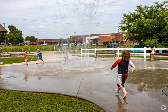 Kids love frolicking through the splash pad at Powell Station Park.