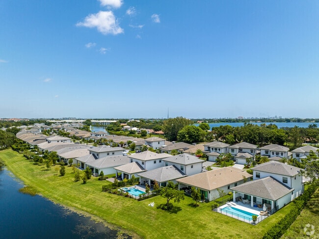 A long row of modern Spanish Revival homes lines the streets of Banyan Cay.