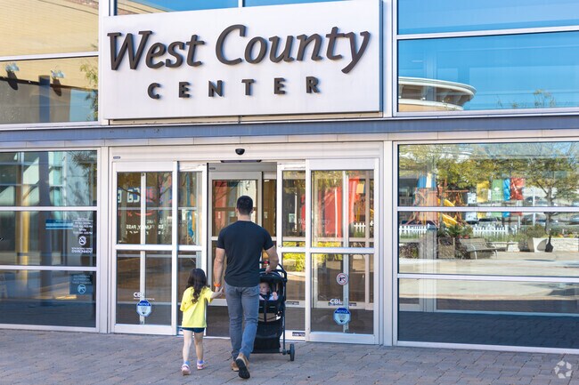 Adults and children enjoy shopping at the West County Center in Des Peres.