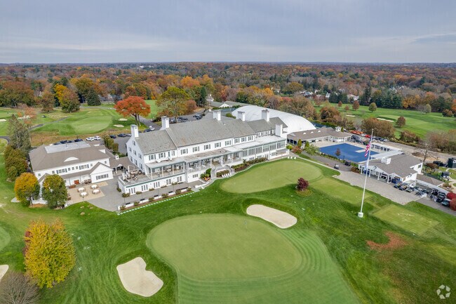 Residents of Mid-Country East enjoy socializing at Greenwich Country Club.