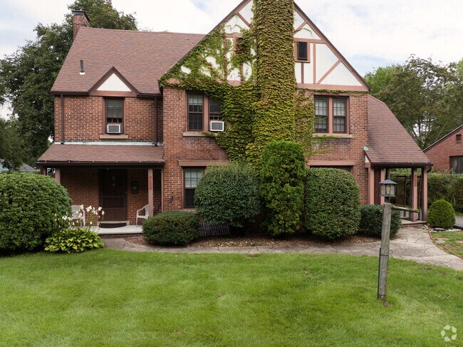 A beautiful brick tudor found in Liberty Heights.