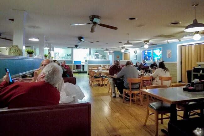 Visitors become family in the busy and social Captain Steves Seafood Restaurant in Gold Hill.