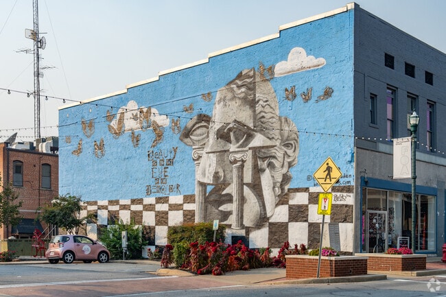 Vibrant murals adorn the walls of downtown Jonesboro's historic buildings.