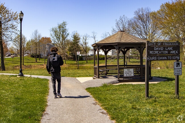 David Lane Park is tucked away behind homes in Frederick Heights/Overlook and has a small lake with a walking path.