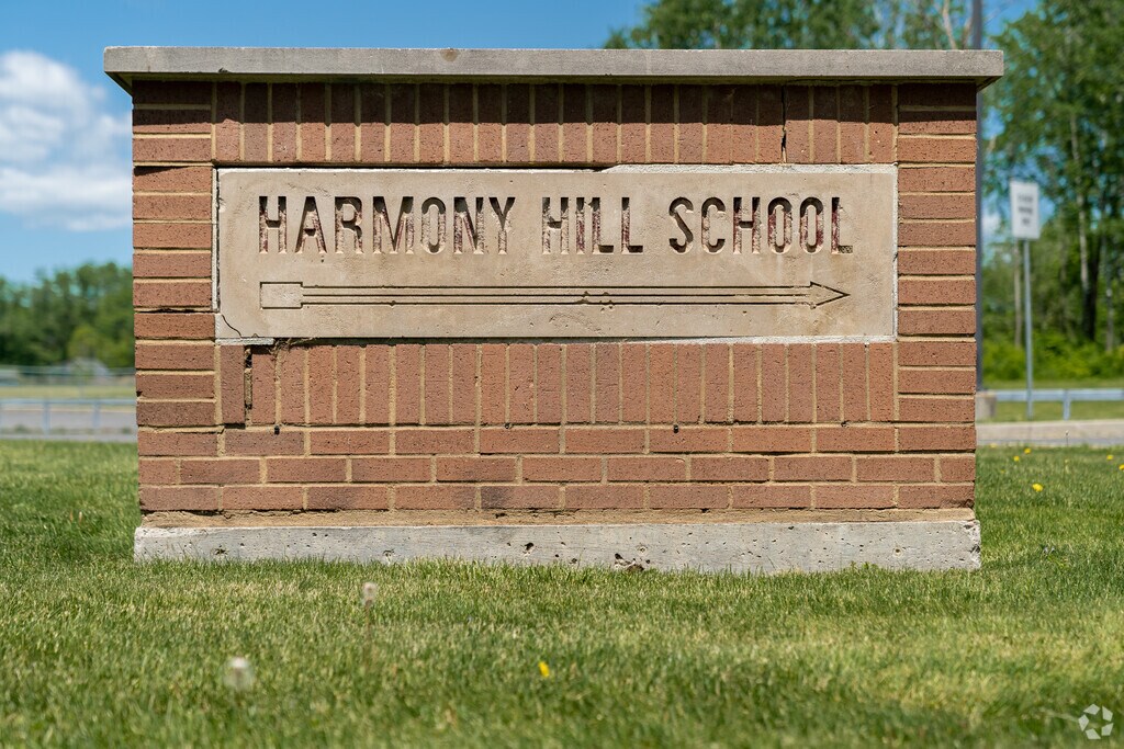 The Harmony Hill School sign is a work of art itself.