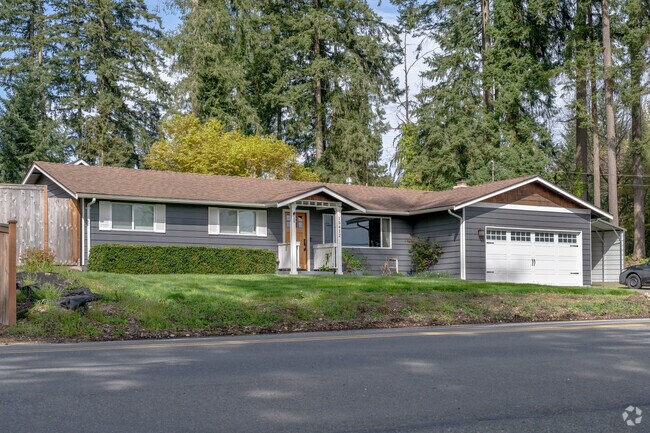 Find your slice of paradise in a charming rambler home in Martha Lake.