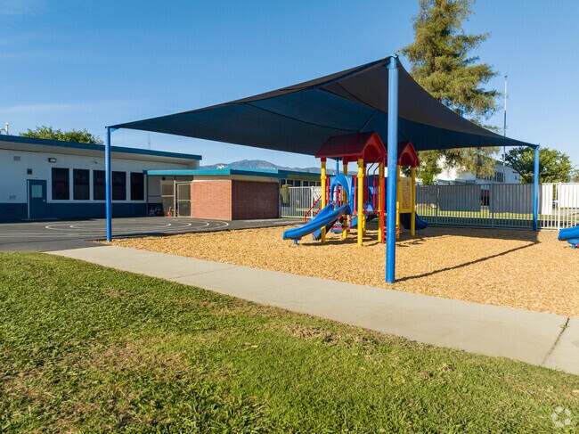 Students enjoy a shaded playground at Vineland Elementary School.