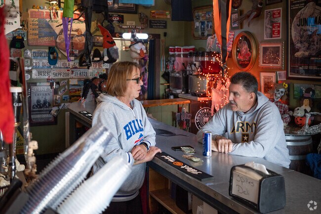 Near Arkwright, locals gather at Spikes Daileys by the boardwalk of Lake Erie for a drink.