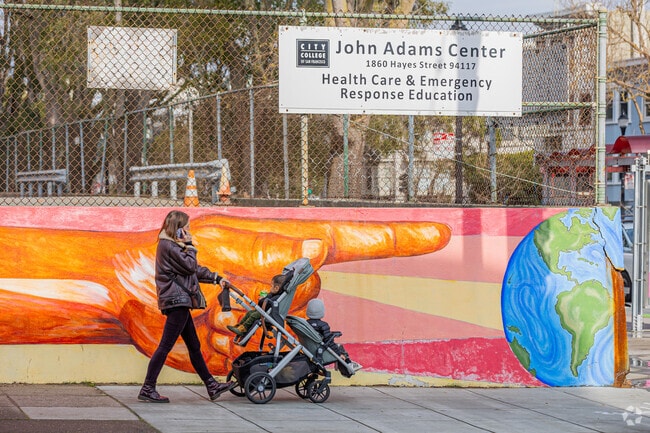 A mother and child embark on a new journey through North Park's streets.
