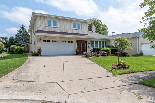 O'Hare has many split-level homes with open lawns.