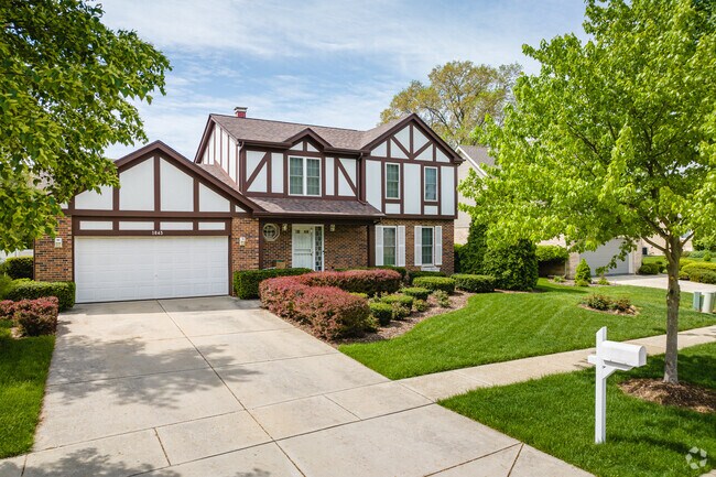 Tudor Revival architecture is a popular style found in many Woodridge, IL neighborhoods.