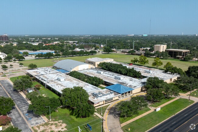 Explore Bryan Collegiate High School layout with an aerial view of the campus.