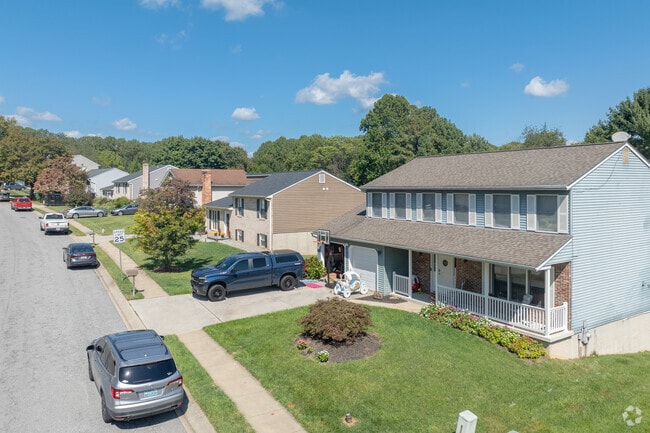 Suburban streets in Marriottsville feature sidewalks and neatly spaced single-family homes.