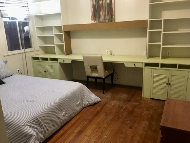 One of three upstairs bedrooms w/queen bed