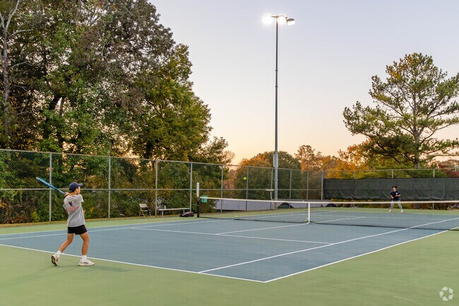 Friends love playing tennis at the Cox Creek Park courts in Florence.
