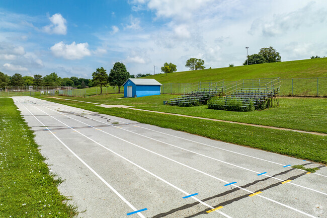 You will find a full-size track and soccer field for athletics and PE.