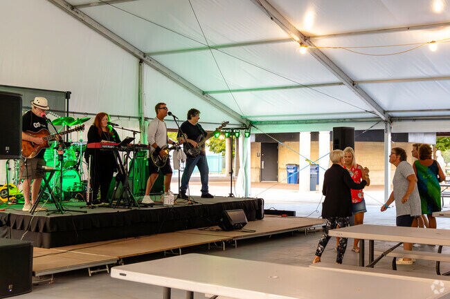 Locals dance and enjoy live entertainment at Hot Harbor Nights in Downtown Racine.